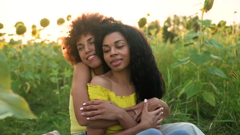 women in a sunflower field