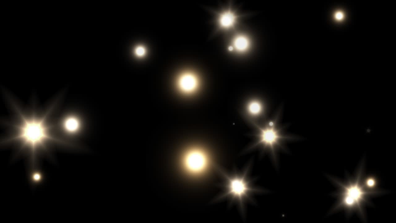 빛나는 별 입자는 검은 바탕에 무작위적인 방향으로 빛나고 빛납니다.