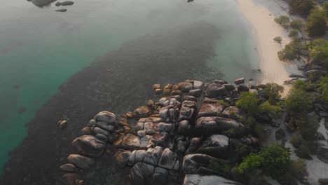 Drone-view-of-Tanjung-Tinggi-beach-in-Belitung-Indonesia,-aerial