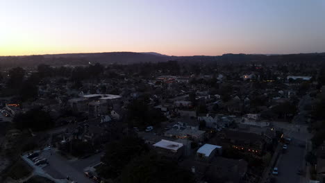 aerial view of santa cruz california over the sand at sunset shot in 4k high resolution