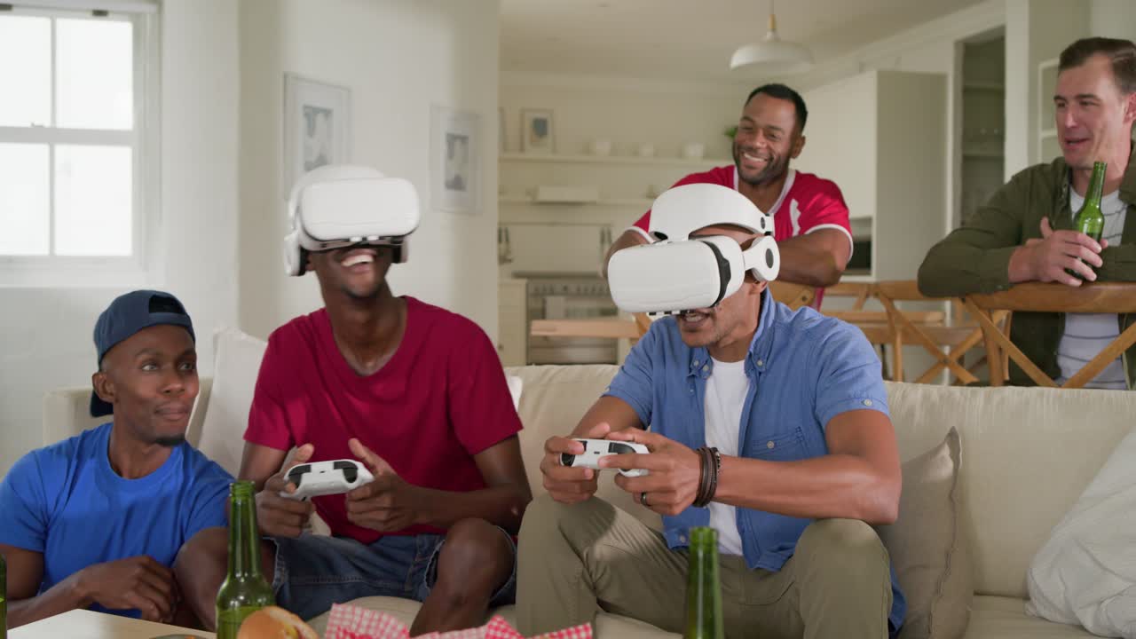 Vertical video: African American men putting on VR headsets with gamepads starting to play in home