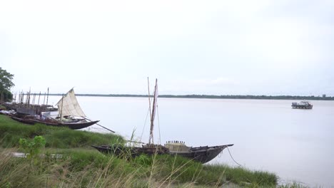 a sailing boats stood on bank of river ganges