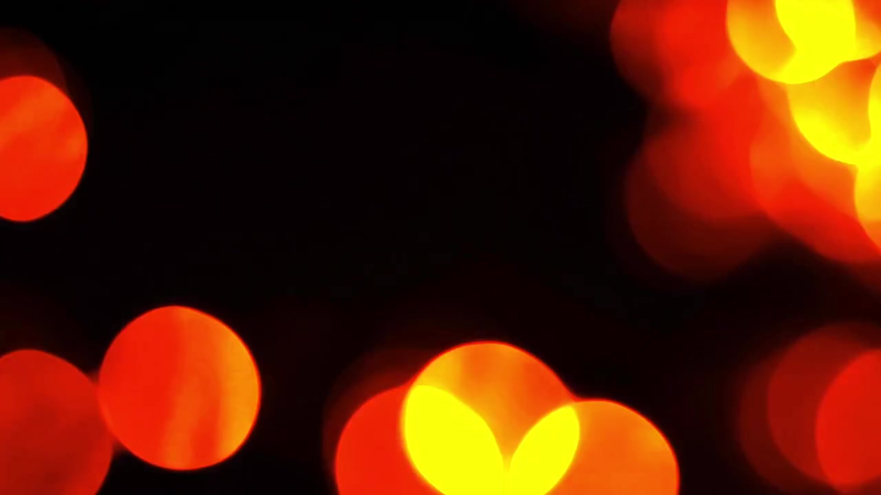Abstract Background of Glowing Red and Orange Bokeh Lights