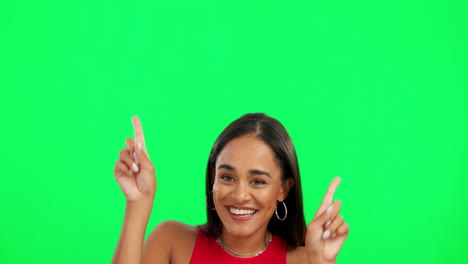 Happy-woman,-dancing-and-pointing-on-green-screen