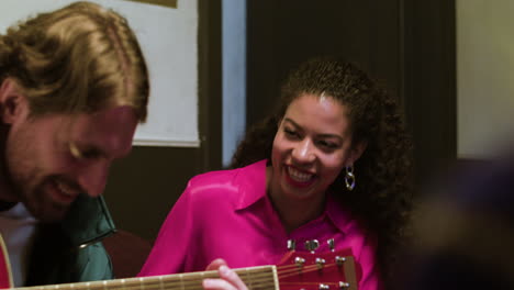 Young-man-playing-the-guitar