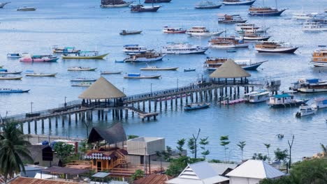 labuan bajo pier and marina development with moored boats on flores island, nusa tenggara region of east indonesia