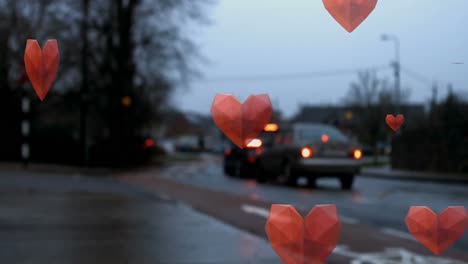 animation of red hearts falling over road traffic