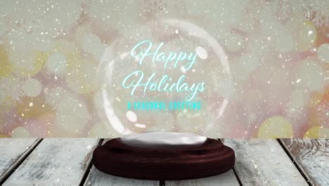 Pink-shooting-star-around-happy-holidays-text-over-a-snow-globe-on-wooden-plank