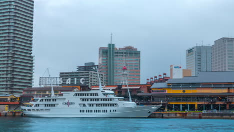 Moving-timelapse-at-Kobe-city-Osaka-Japan-cloudy-day-at-Harbourfront-panning