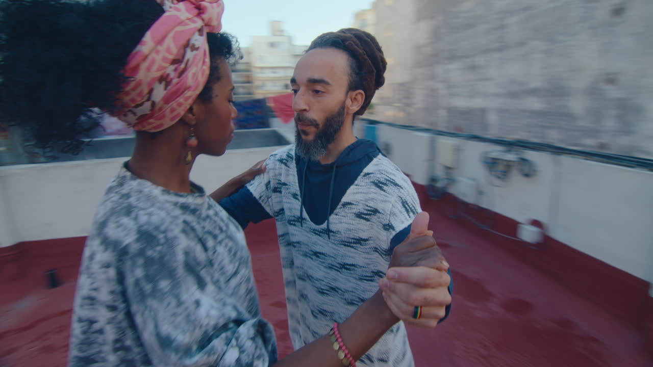 360-Degree Shot of Couple Dancing Tango on a Rooftop