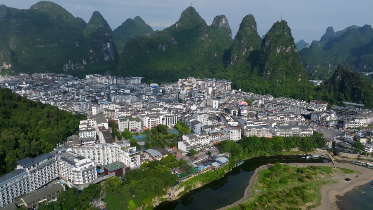 Panoramic drone shot around the Yangshou town, summer day in Guangxi, China