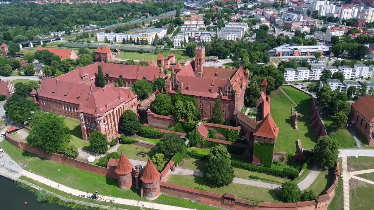 Imposing Malbork Castle In The Town Of Malbork, Poland. Aerial Drone Shot