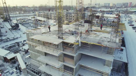 winter construction site of a multi-story building