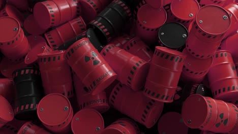 pile of red and black radioactive waste barrels