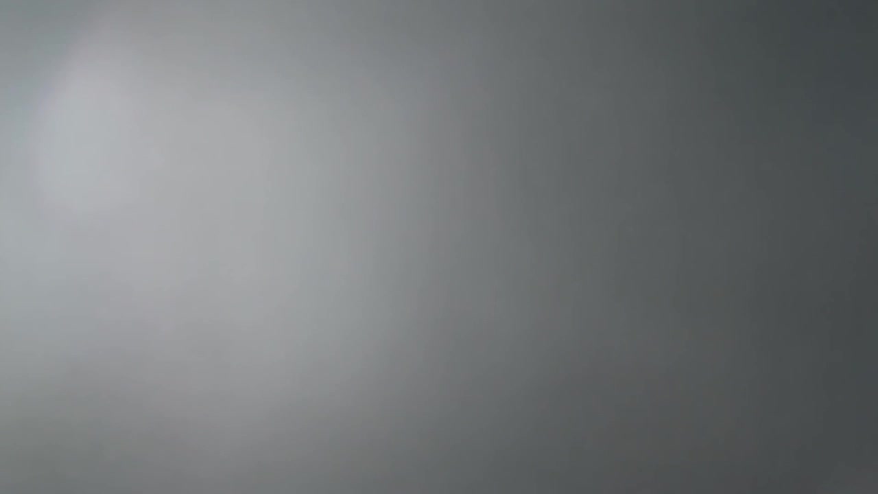 Abstract Grey Background with Soft Light Leaks and Lens Flare