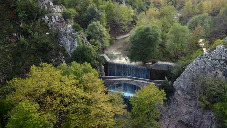 4k over an old stoned bridge of palaiokarias,thessaly in greece