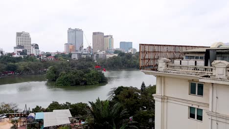 panoramic view of lake and city buildings