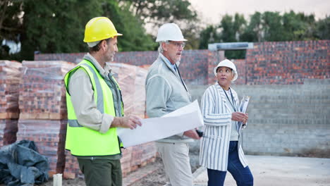construction workers and architects at a construction site