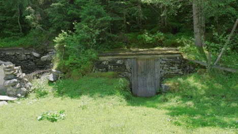 Panning-View-of-Small-Hillside-Ruins-with-Entrance