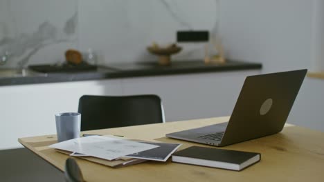 modern home office with laptop and documents