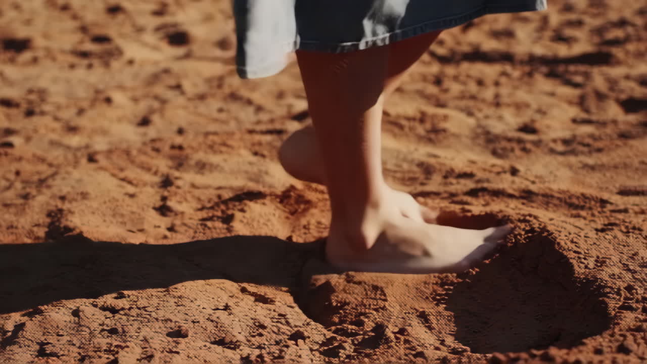 Barefoot steps on warm sand