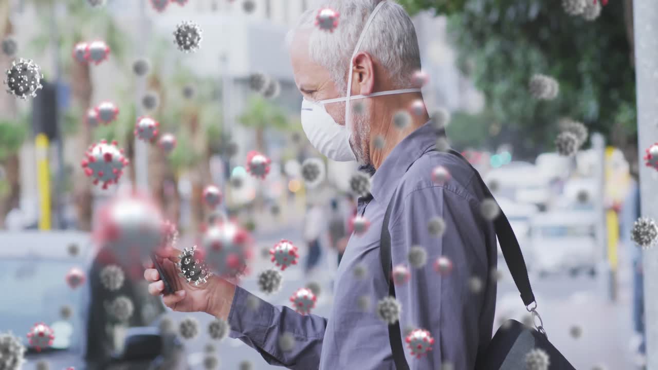 Animation of covid 19 cells over senior man wearing face mask