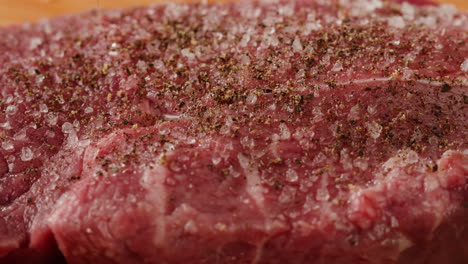 close-up of seasoned raw steak