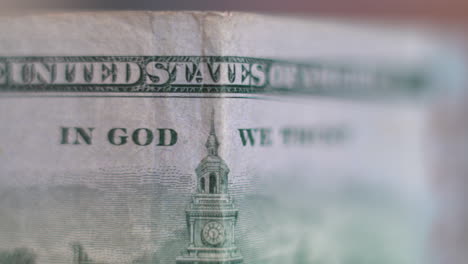 unites states of america money in macro - concept: in god we trust, clock, tower, liberty, banknote, promissory note, legal tender