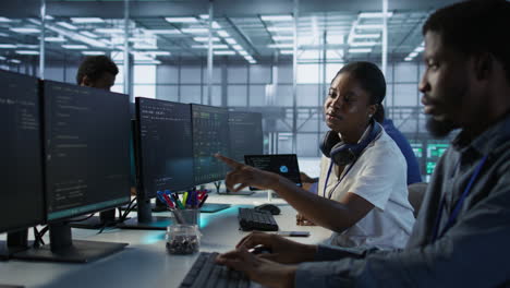 team of it professionals working in a data center