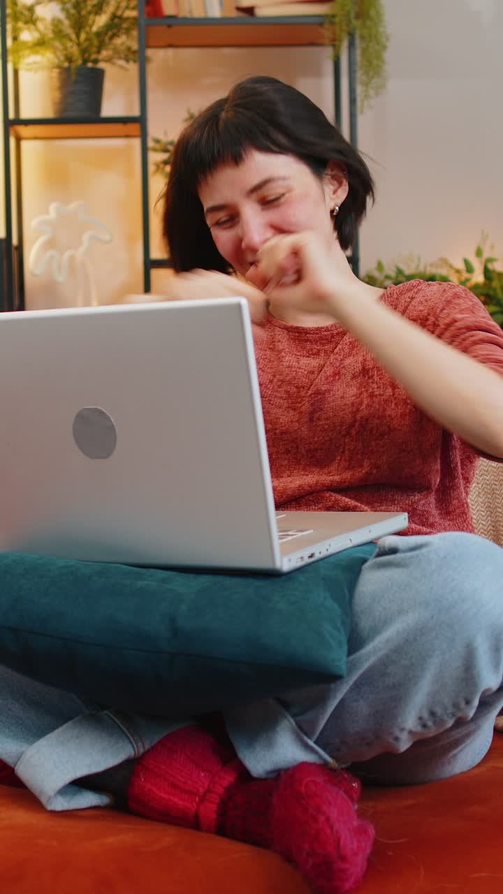 Woman using laptop receive good news shocked by sudden victory celebrate lottery jackpot win