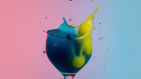 Vibrant Color Splash in a Glass: A Captivating Journey Through Fluid Dynamics and Artistic Expression with Lively Colors and Stunning Beauty