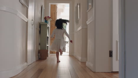 happy little girl running through house wearing tutu excited to play outside child having fun on weekend morning enjoying childhood 4k footage