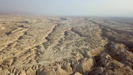 aerial footage over soft sedimentary rock desert wadi israel