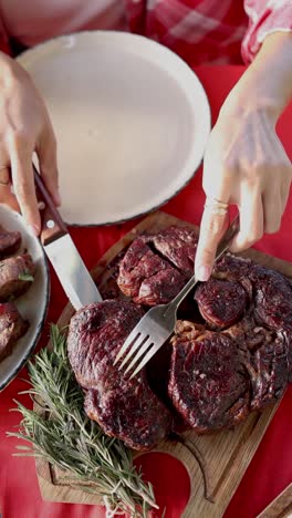 woman eating grilled steak