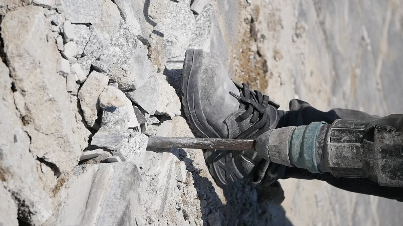 Demolishing Concrete with a Jackhammer