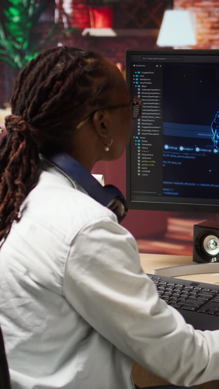 Vertical video Happy programmer celebrating after successfully implementing AI code