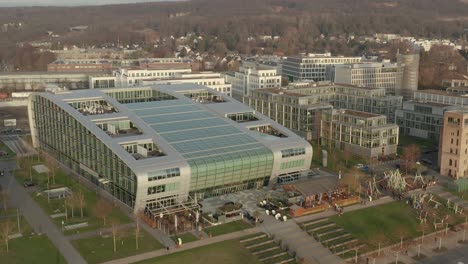 cinematic drone -aerial shot of the kameha grand hotel bonn at golden hour - afternoon, 30p