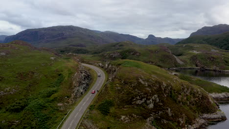 Drone-shot-of-the-Kylesku-Bridge-in-north-west-Scotland-that-crosses-the-Loch-a'-Chàirn-Bhàin-in-Sutherland