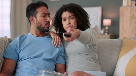arguing couple, tv remote and controlling woman