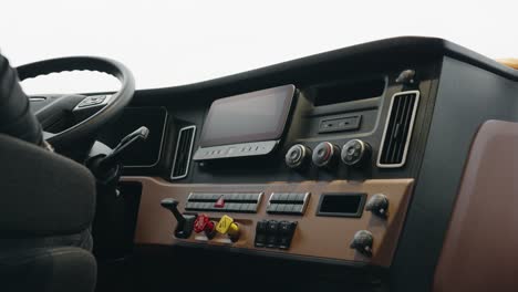 wide shot inside in cabin of a new freightliner cascadia volvo 2023 semi truck