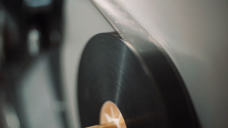 roll with film tape loaded on a projection machine