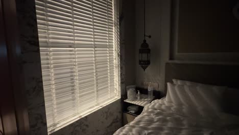 dark and cozy hotel bedroom at night
