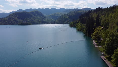 aerial view of a lone kayak in lake bled, slovenia