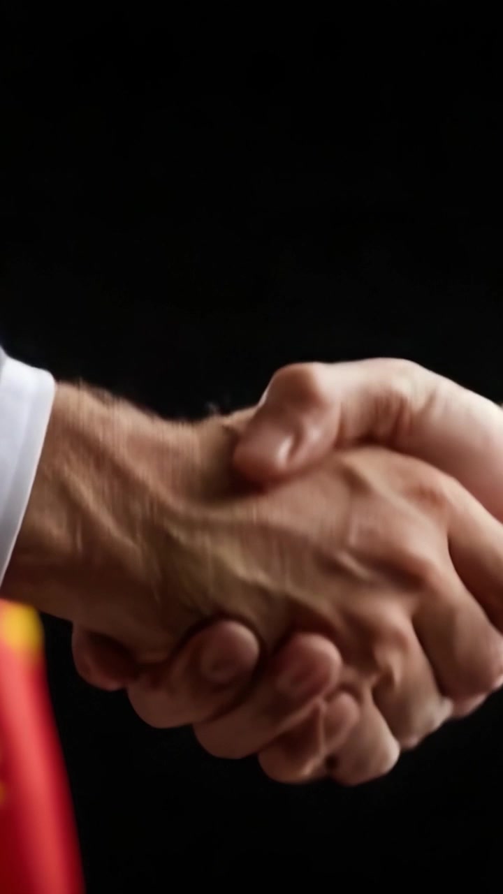 Symbolic Handshake: A Close-Up Moment Capturing Collaboration and Unity, Representing Agreement and Cooperation in a Professional Context