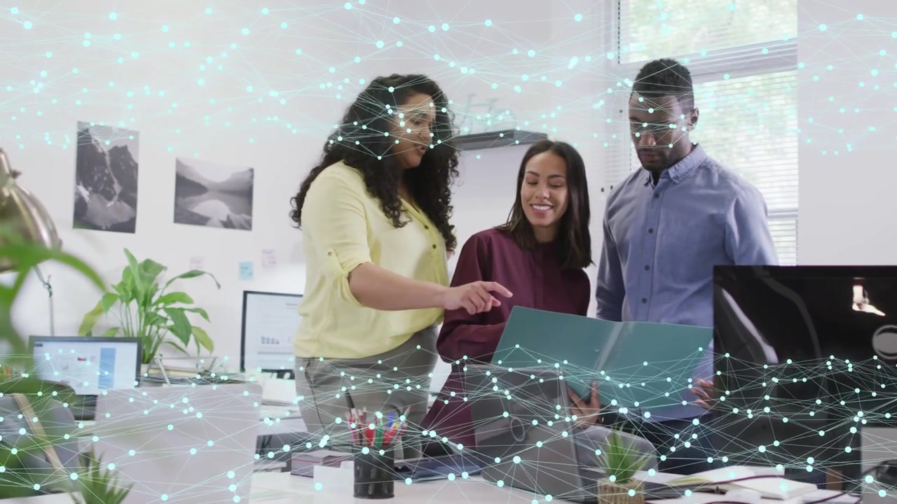 Vertical video: Tech team reviewing teal folder woman reaching causing node highlighting for review