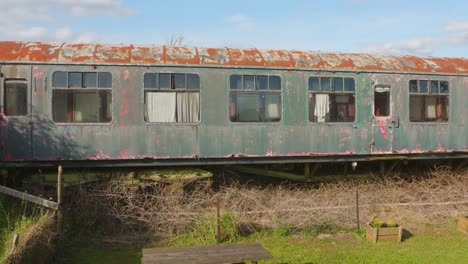 rusty old train carriage in a garden