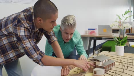 woman and man working in a creative office