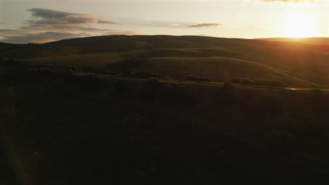 Establishing-Aerial-Drone-Shot-of-Railway-Line-Near-Ribblehead-Viaduct-at-Sunrise