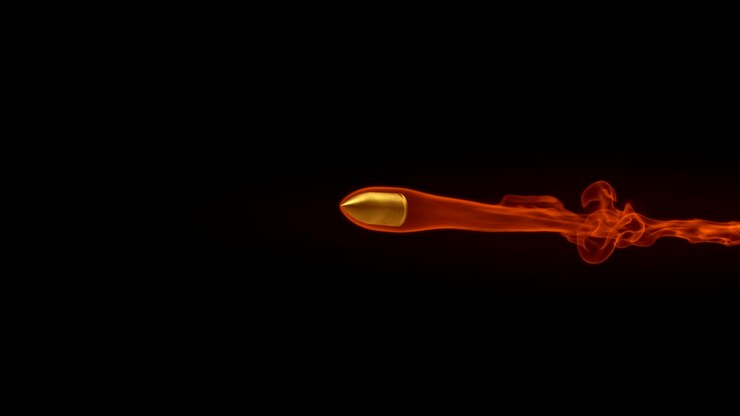 Animation of a flying bullet with fire trail on black background