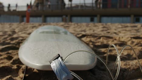 surfer man walking to the beach at sunset preparing for surfing training and search for waves in barcelona, spain, water, ocean exercise in sea with board, athletic male holiday or travel in vacation